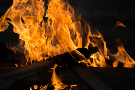 Fire and Frame with firewood の写真素材