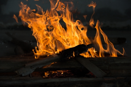 Fire and Frame with firewood の写真素材