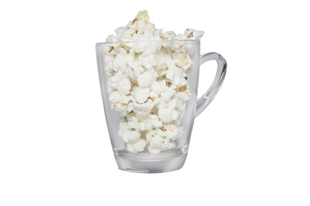 Popcorn in glass with white backgroundの写真素材