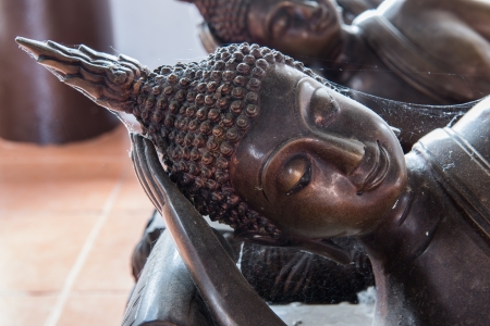 Black Buddha images in sleeping attitudeのeditorial素材