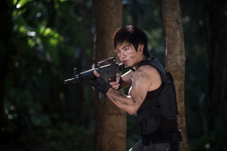 Special force with the gun in the jungleの写真素材