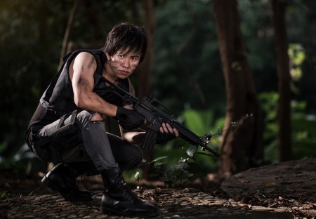 Special force with the gun in the jungle