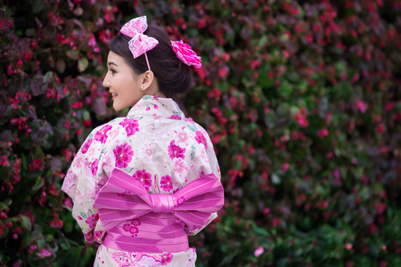 Beautiful young woman wearing japanese traditional Yukataの写真素材