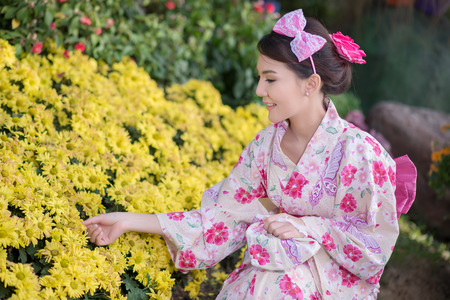 Beautiful young woman wearing japanese traditional Yukataの写真素材