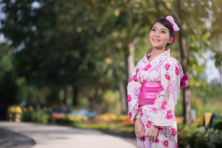 Beautiful young woman wearing japanese traditional Yukataの写真素材
