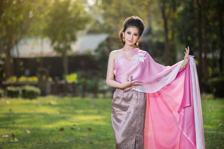 Beautiful Thai girl in Thai traditional costumeの写真素材