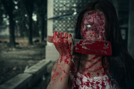 Suicidal girl in haunted school with cleaver