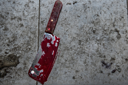 Dirty cleaver cover with bloodの写真素材
