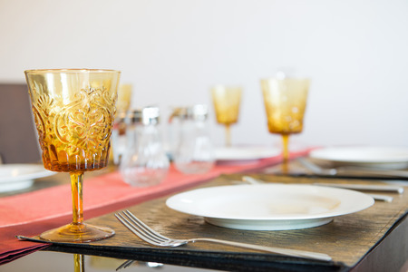 Tables set for mealの写真素材