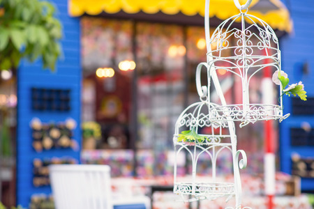 vintage wedding decorative birdcage with flowersの写真素材