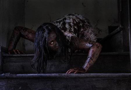 Zombie girl in haunted houseの写真素材