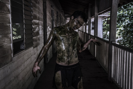 Ugly Zombie man in haunted houseの写真素材