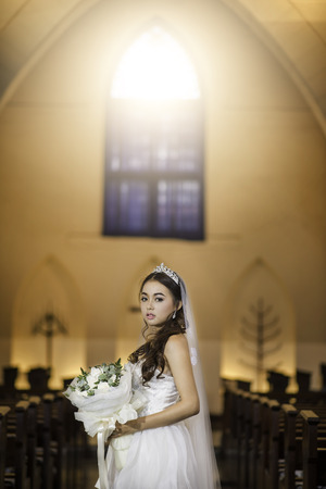 Beautiful bride in the Churchの写真素材