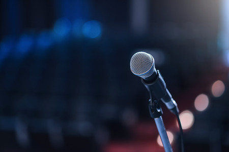 Close up of microphone in concert hall or conference room