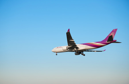 CHIANGMAI, THAILAND- JAN 03 2015 :Airbus A330-300 of Thai airways. Flying on the sky to the destination.のeditorial素材