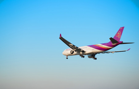 CHIANGMAI, THAILAND- JAN 03 2015 :Airbus A330-300 of Thai airways. Flying on the sky to the destination.のeditorial素材