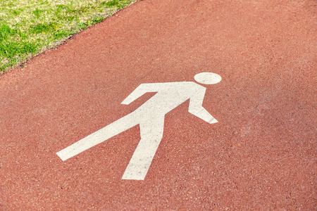 Pedestrian Sign / Road signs - painted sign on asphalt for pedestrian laneの写真素材