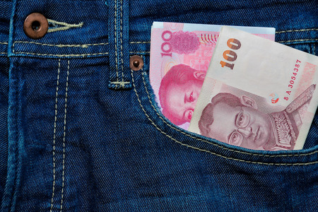 Yuan or RMB and Thai Baht in Jean's pocket