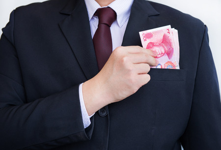 Picking Yuan or RMB, Chinese Currencyの写真素材