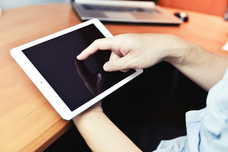 playing tablet- Hand Focused