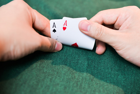 Poker Cards on hands