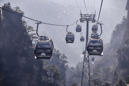 Hunan, China: FEB 29, 2016. Tianmen Shan cable car is the longest cable car ride in the world, covering a distance of 7,455 meters. The car runs from Zhangjiajie downtown up to Tianmen Shan, Chinaのeditorial素材