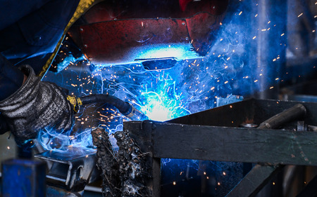 Arc welding of a steel in factory