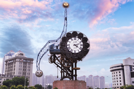 Tianjin, China - JULY 04, 2016: Cityscape of Century clock stands 40-meters high and weighs 170-tons, it represents the beginning of the Chinese Modern Industry in Tianjin.のeditorial素材
