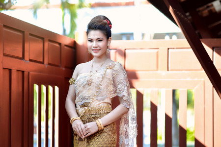 Beautiful Thai girl in Thai traditional costumeの写真素材