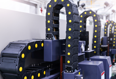 Cable belt of CNC machine in factoryの写真素材