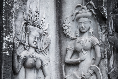Detail of stone carvings of Apsara is a beautiful and seductive girl of Hindu mythology at Angkor Wat, Cambodiaのeditorial素材