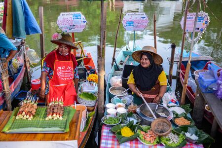 SONGKHLA, THAILAND - April 15, 2018: Sellers sell food and souvenirs at Klonghae Floating Market in Hat Yai, Thailand. The First floating Market in the South of Thailand.のeditorial素材