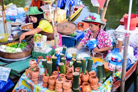 SONGKHLA, THAILAND - April 15, 2018: Sellers sell food and souvenirs at Klonghae Floating Market in Hat Yai, Thailand. The First floating Market in the South of Thailand.のeditorial素材