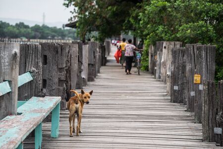 MANDALAY, MYANMAR - JUL 17, 2018: a life of Burmese at Ubein Bridge (World longest wooden bridge) in Mandalay, Myanmarのeditorial素材