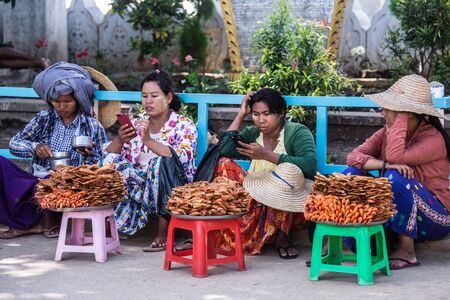 MANDALAY, MYANMAR - JUL 18, 2018: The way of people life in myanmar. The authentical culture of society.のeditorial素材