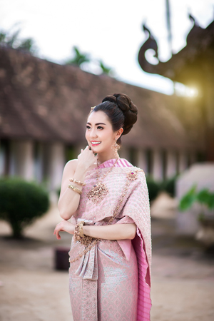 Beautiful Thai girl in Thai traditional costumeの写真素材