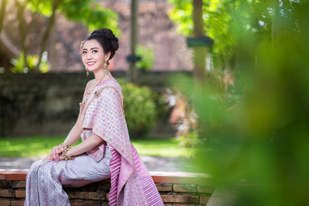Beautiful Thai girl in Thai traditional costumeの写真素材