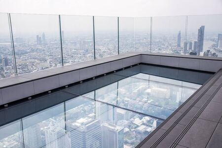 BANGKOK, THAILAND - DEC 07, 2018: King Power Mahanakhon building, roof top cityscape and Glass floor on 78th floor Bangkok, Thailand.のeditorial素材