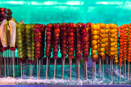Tang hulu or Chinese sugar-coated fruit stick. The snack of China in the Winter.の写真素材