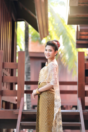 Beautiful Thai girl in Thai traditional costumeの写真素材