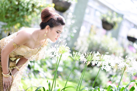 Beautiful Thai girl in Thai traditional costumeの写真素材