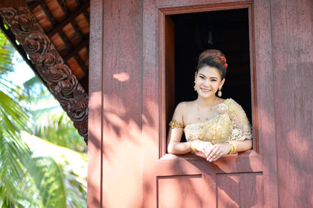 Beautiful Thai girl in Thai traditional costumeの写真素材