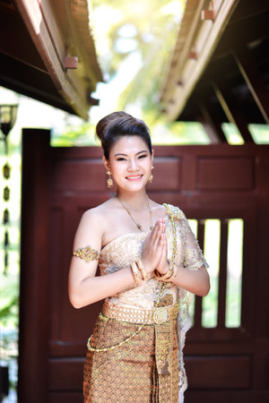 Beautiful Thai girl in Thai traditional costumeの写真素材