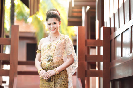 Beautiful Thai girl in Thai traditional costumeの写真素材