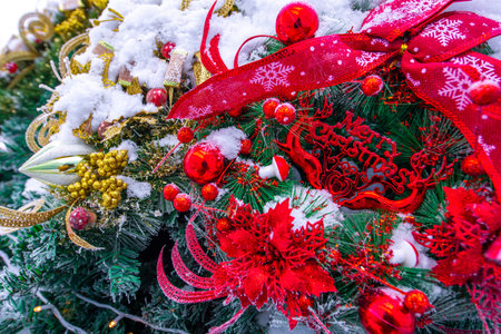 Christmas tree and decorations outdoor in snow winterの写真素材
