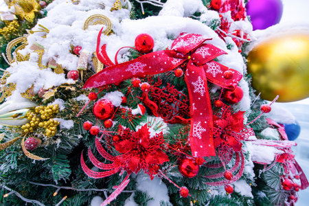 Christmas tree and decorations outdoor in snow winterの写真素材
