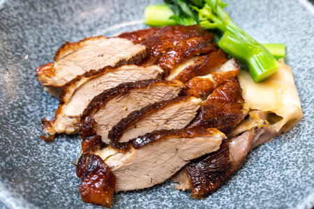 Sliced roasted duck on dish for mealの写真素材