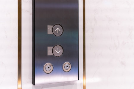 elevator botton for disabled person on the marble wall