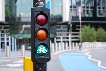 Green cycle traffic light in the city
