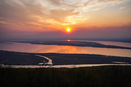 The sunset and river beyond the horizonの写真素材